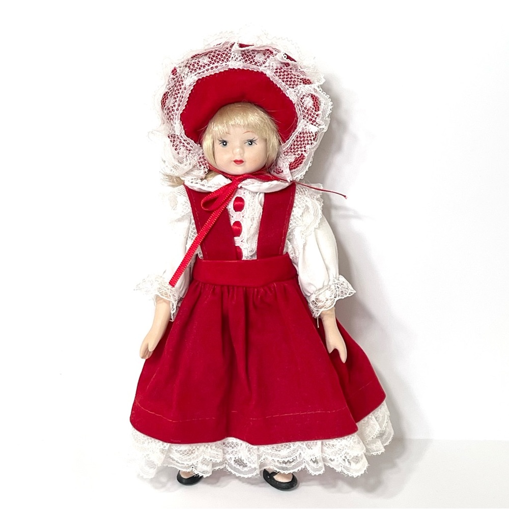 vintage porcelain doll With Red Dress